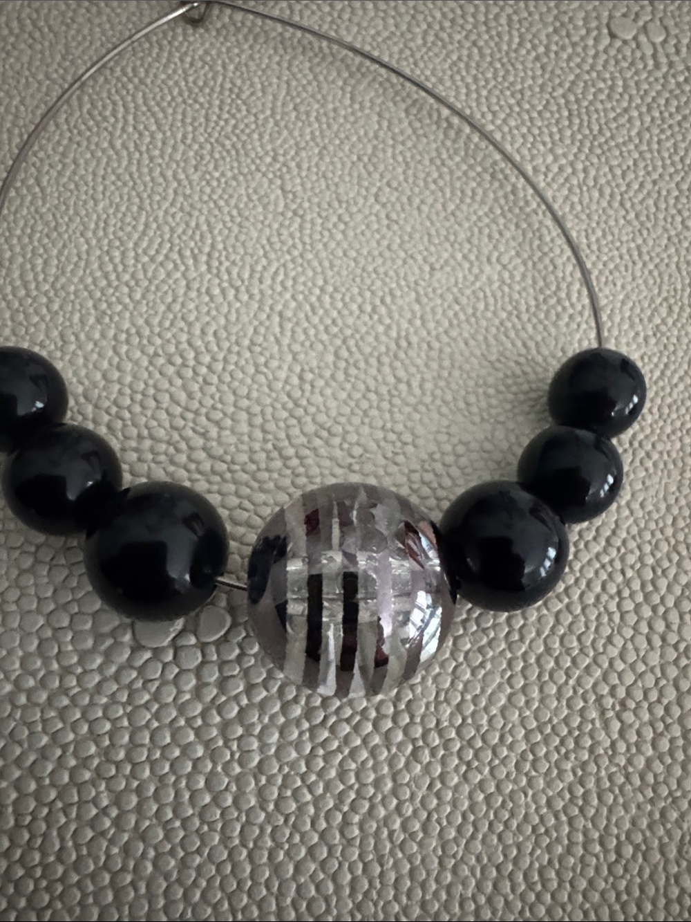 Silver Hoop Earrings with Black Beads and Striped Accent Bead - Picture 3 of 4